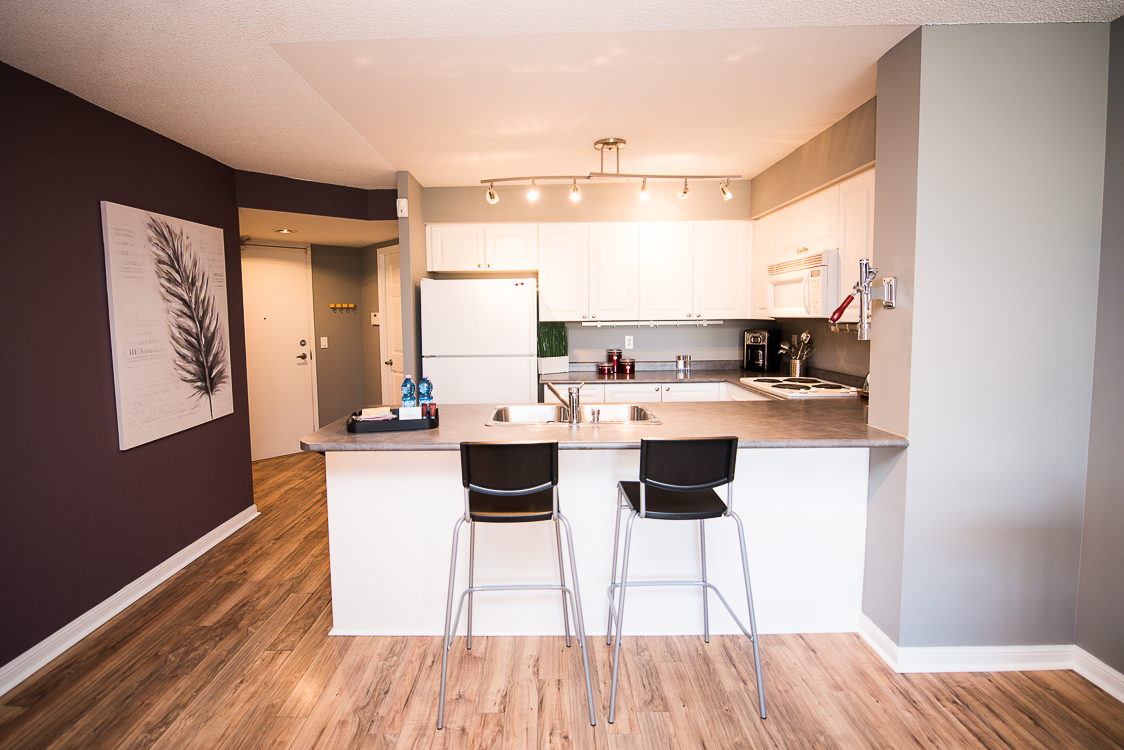 Adelaide & Sherbourne executive rentals toronto purple wall kitchen