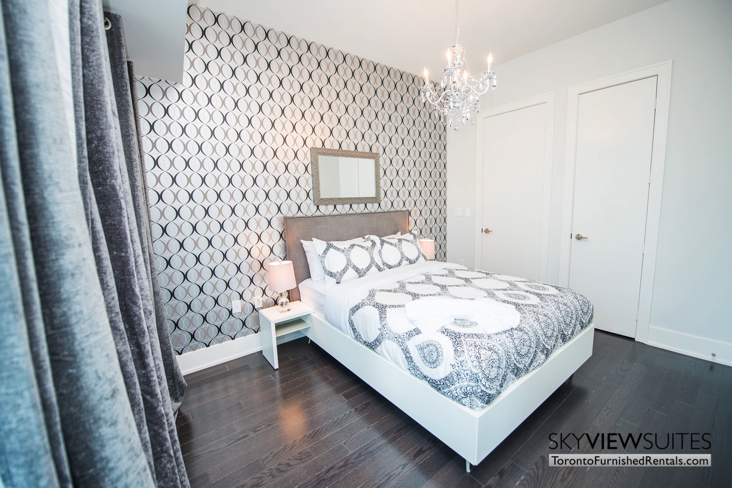 executive rentals toronto 39 Queens Quay bedroom with patterned wallpaper