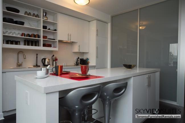 furnished apartments toronto portland kitchen and island table