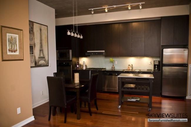 furnished suites toronto 23 Brant Street dining room and kitchen