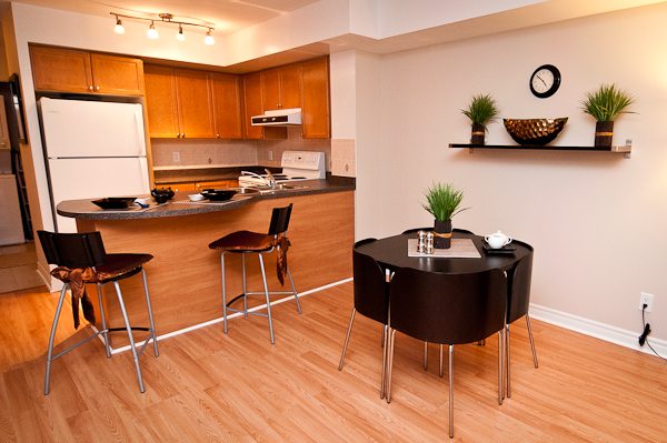 corporate rentals toronto empire living room and kitchen