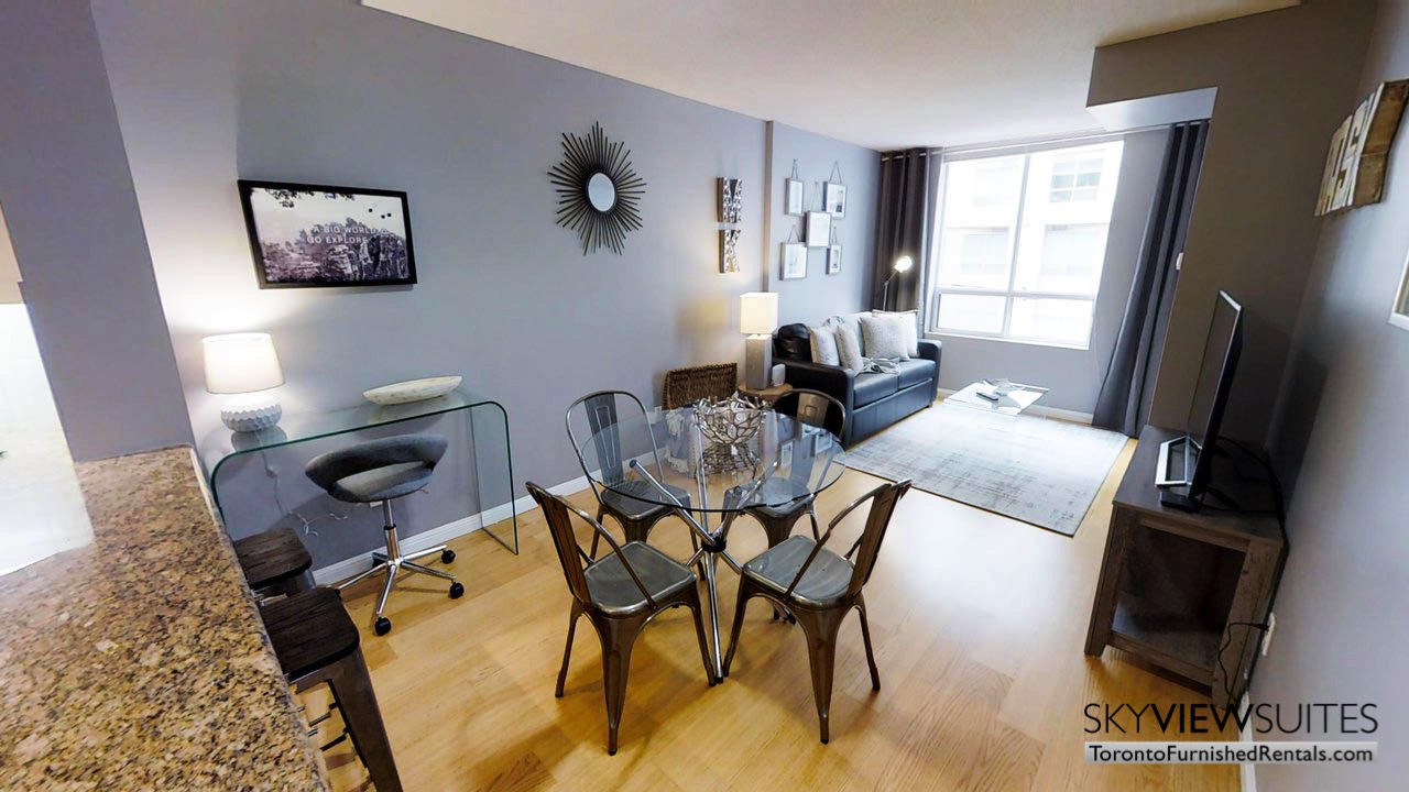 furnished suites toronto university plaza living room with table