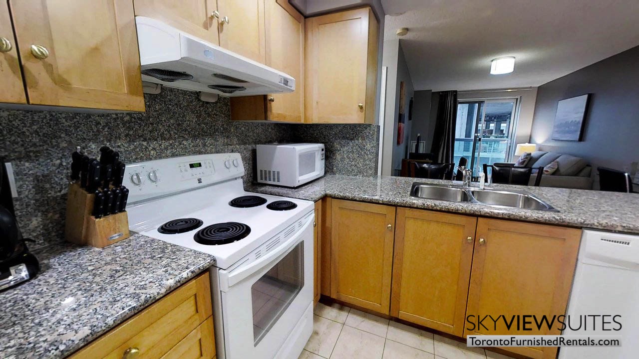 furnished rentals toronto simcoe and richmond kitchen and living room