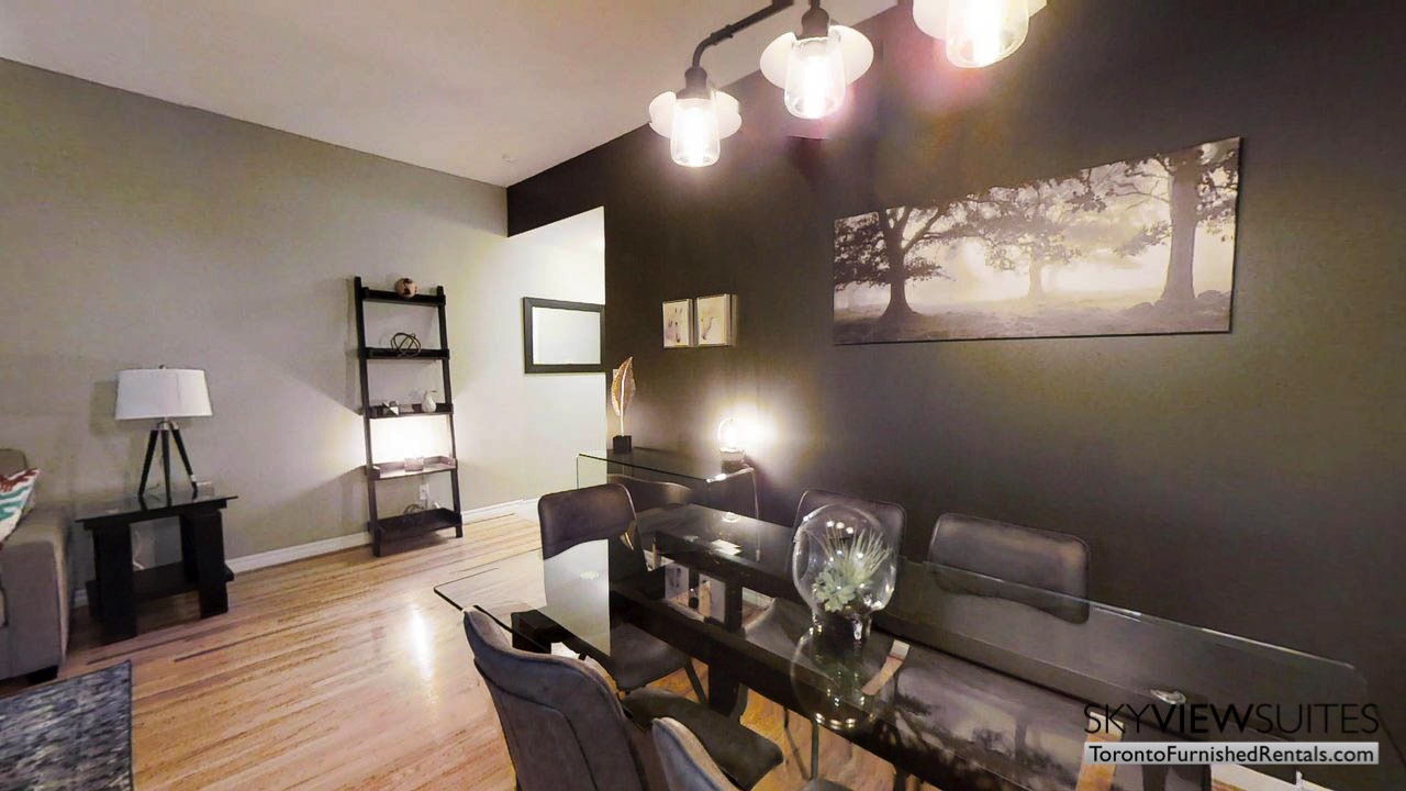 short term rentals toronto qwest living room with tree art