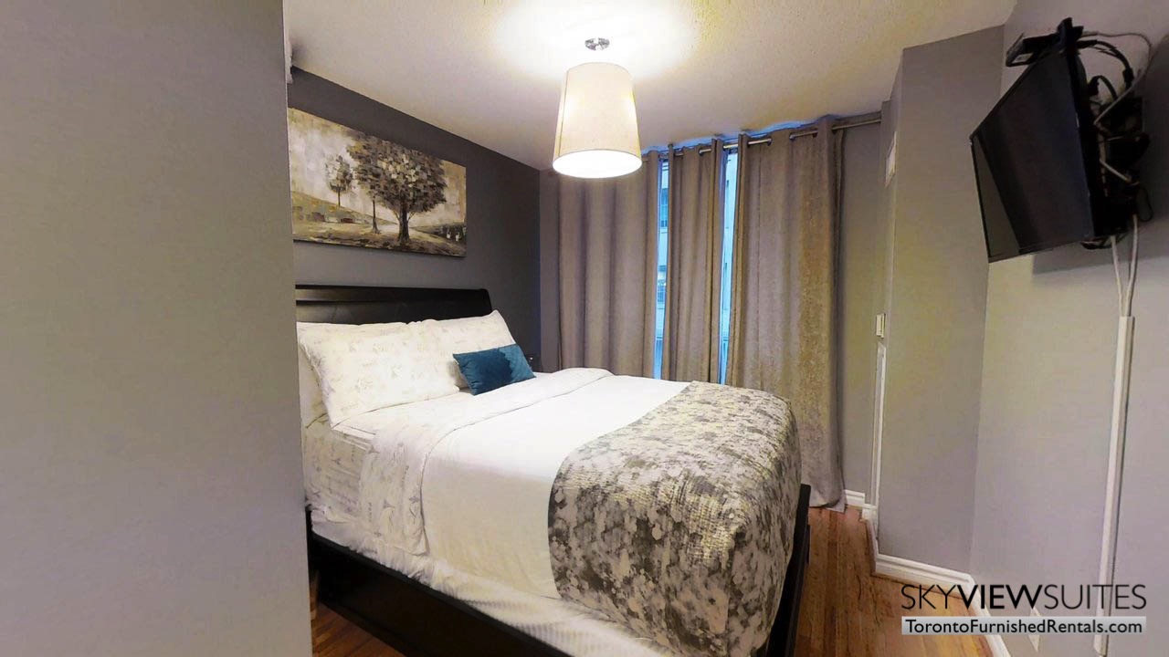 short term rentals toronto qwest bedroom with television wall mount