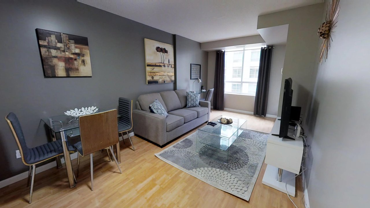 executive rentals toronto university plaza living room and dining table