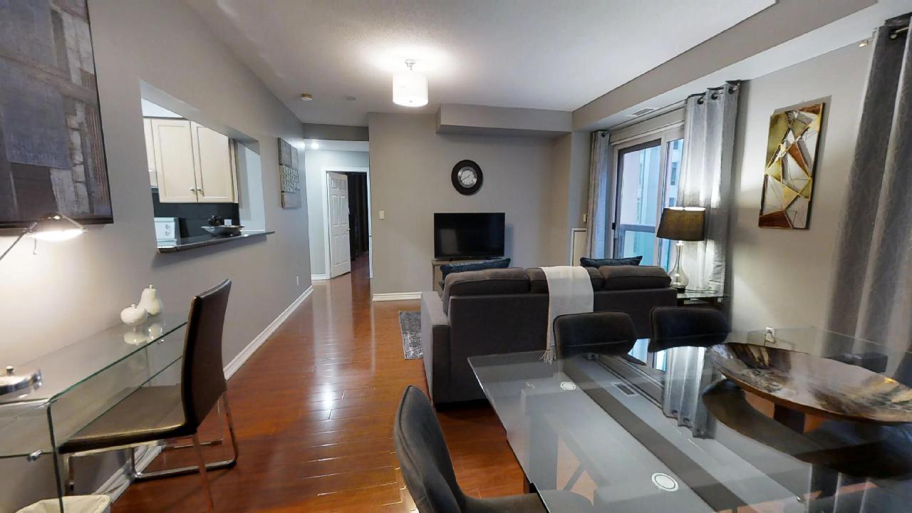 alternative view of a living room in Qwest's two bedroom furnished apartment in TOronto, near osgoode station