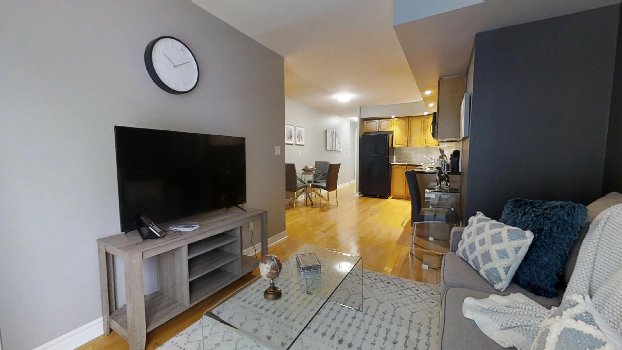 living room and kitchen view in Icon furnished condo in toronto