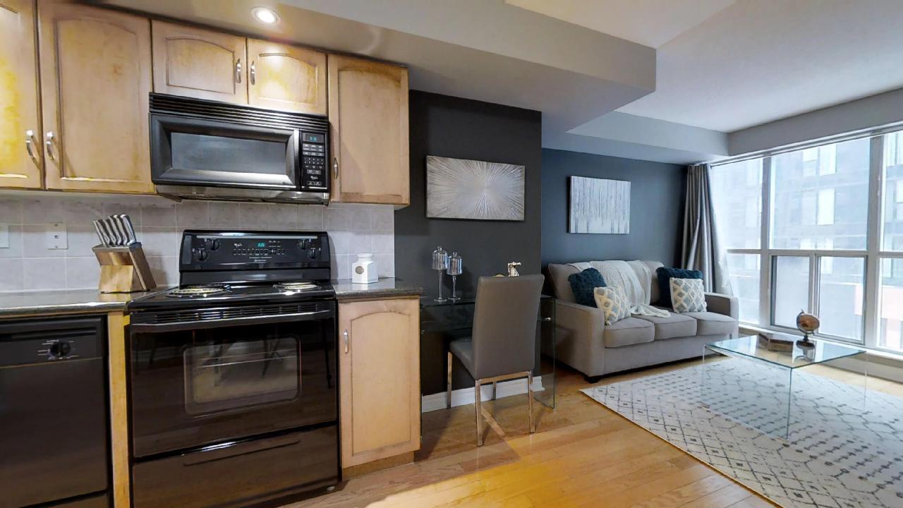 living room and kitchen in toronto furnished apartment near wellington toronto